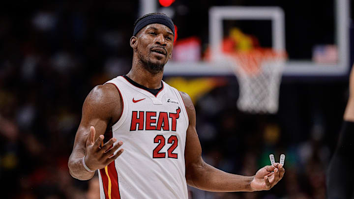 Feb 29, 2024; Denver, Colorado, USA; Miami Heat forward Jimmy Butler (22) reacts after a play in the second quarter against the Denver Nuggets at Ball Arena. Feb 29, 2024; Denver, Colorado, USA; Miami Heat forward Jimmy Butler (22) reacts after a play in the second quarter against the Denver Nuggets at Ball Arena.