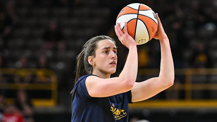 May 4, 2025; Iowa City, IA, USA; Indiana Fever guard Caitlin Clark (22) warms up before the game against Brazil National Team at Carver-Haweye Arena. Mandatory Credit: Jeffrey Becker-Imagn Images