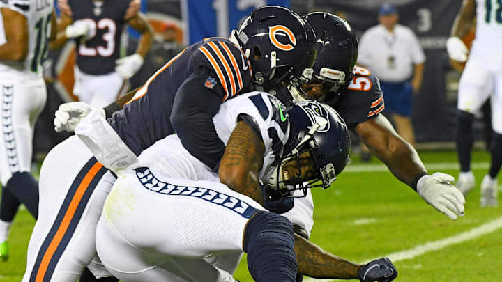 Sep 17, 2018; Chicago, IL, USA; Seattle Seahawks wide receiver Brandon Marshall (15) is tackled by Chicago Bears linebacker Khalil Mack (52) during the second quarter at Soldier Field. Mandatory Credit: Mike DiNovo-Imagn Images