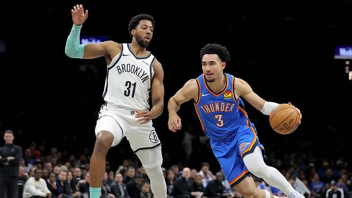 Mar 18, 2026; Brooklyn, New York, USA; Oklahoma City Thunder guard Jared McCain (3) drives to the basket against Brooklyn Nets forward Chaney Johnson (31) during the first quarter at Barclays Center. Mandatory Credit: Brad Penner-Imagn Images Mar 18, 2026; Brooklyn, New York, USA; Oklahoma City Thunder guard Jared McCain (3) drives to the basket against Brooklyn Nets forward Chaney Johnson (31) during the first quarter at Barclays Center. Mandatory Credit: Brad Penner-Imagn Images