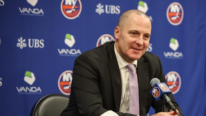 Nov 22, 2025; Elmont, New York, USA; New York Islanders General Manager Mathieu Darche speaks with fans at a pre-game event prior to the game against the St. Louis Blues at UBS Arena. Mandatory Credit: Wendell Cruz-Imagn Images