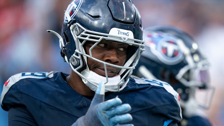 Tennessee Titans linebacker Arden Key (49) is congratulated after sacking New England Patriots quarterback Drake Maye (10) during their game at Nissan Stadium in Nashville, Tenn., Sunday, Nov. 3, 2024.