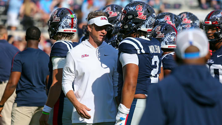 Oct 26, 2024; Oxford, Mississippi, USA; Mississippi Rebels head coach Lane Kiffin talks with defensive lineman Walter Nolen (2) prior to the game against the Oklahoma Sooners at Vaught-Hemingway Stadium. Mandatory Credit: Petre Thomas-Imagn Images Oct 26, 2024; Oxford, Mississippi, USA; Mississippi Rebels head coach Lane Kiffin talks with defensive lineman Walter Nolen (2) prior to the game against the Oklahoma Sooners at Vaught-Hemingway Stadium. Mandatory Credit: Petre Thomas-Imagn Images