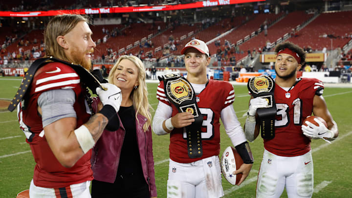 San Francisco 49ers tight end George Kittle (85), quarterback Brock Purdy (13) and running back Isaac Guerendo (31)