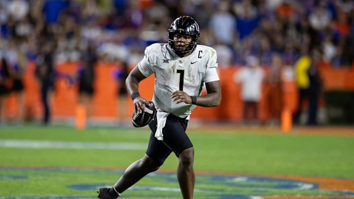 Oct 5, 2024; Gainesville, Florida, USA; UCF Knights quarterback KJ Jefferson (1) runs with the ball against the Florida Gators during the second half at Ben Hill Griffin Stadium. Mandatory Credit: Matt Pendleton-Imagn Images Oct 5, 2024; Gainesville, Florida, USA; UCF Knights quarterback KJ Jefferson (1) runs with the ball against the Florida Gators during the second half at Ben Hill Griffin Stadium. Mandatory Credit: Matt Pendleton-Imagn Images
