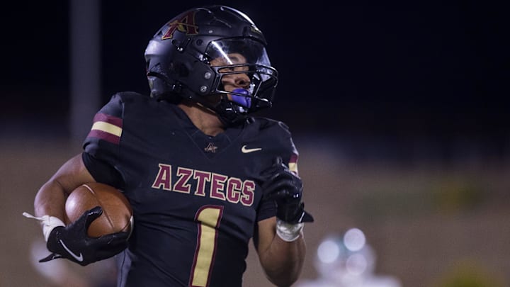 El Dorado's Ryan Estrada (1) runs the ball and makes a touchdown during a football game against Montwood on Friday, Sept. 13, 2024, at the Socorro ISD Student Activities Complex II in El Paso. El Dorado's Ryan Estrada (1) runs the ball and makes a touchdown during a football game against Montwood on Friday, Sept. 13, 2024, at the Socorro ISD Student Activities Complex II in El Paso.