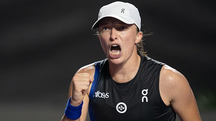 Nov 5, 2023; Cancun, Mexico; Iga Swiatek (POL) reacts to a point during her match against Aryna Sabalenka (BLR) on day eight of the GNP Saguaros WTA Finals Cancun. Mandatory Credit: Susan Mullane-Imagn Images