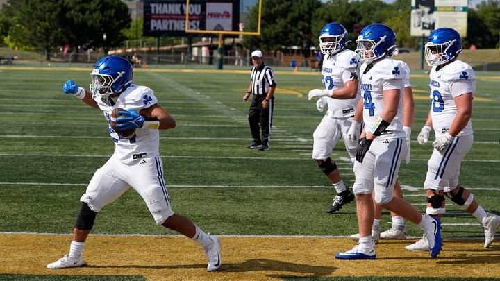 Detroit Catholic Central running back Jalen Montlouis celebrates his touchdown in first half action between Clinton Township Chippewa Valley and Detroit Catholic Central during the High School Football Kickoff Classic at Tom Adams Field at Wayne State University in Detroit on Thursday, August 27, 2026.