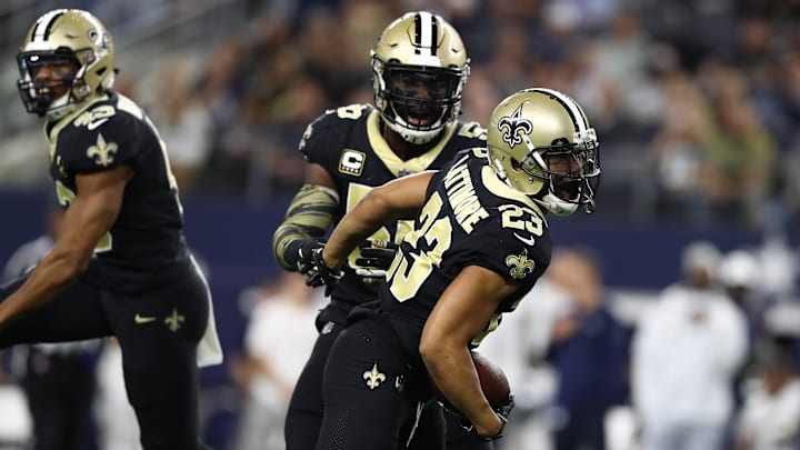 Nov 29, 2018; Arlington, TX, USA; New Orleans Saints cornerback Marshon Lattimore (23) celebrates a fumble recovery in the second quarter against the Dallas Cowboys at AT&T Stadium. Mandatory Credit: Matthew Emmons-Imagn Images