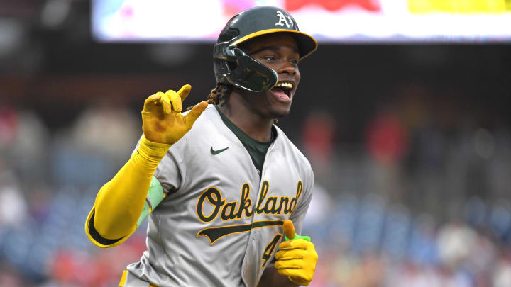 Jul 14, 2024; Philadelphia, Pennsylvania, USA; Oakland Athletics outfielder Lawrence Butler (4) celebrates his third home run of the game against the Philadelphia Phillies during the seventh inning at Citizens Bank Park.