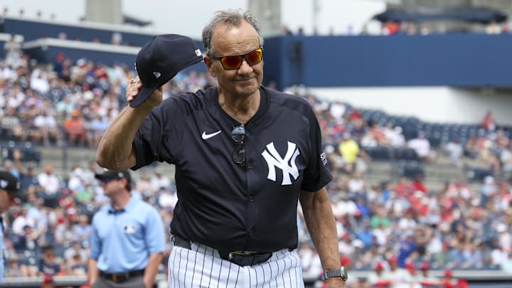 Mar 18, 2024; Tampa, Florida, USA;  New York Yankees former manger Joe Torre brings out the lineup card for a game against the Philadelphia Phillies during spring training at George M. Steinbrenner Field. Mandatory Credit: Nathan Ray Seebeck-Imagn Images