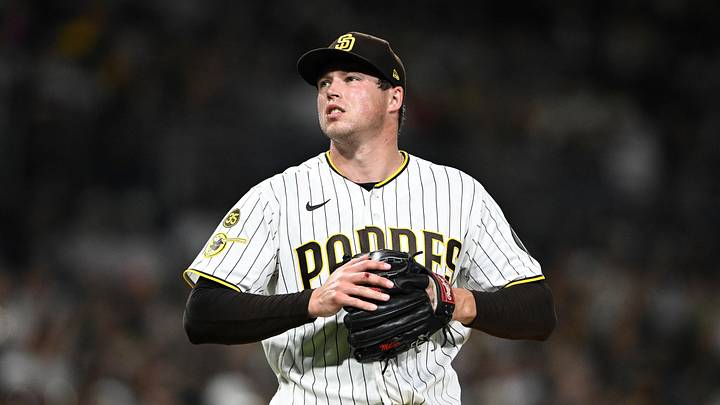 San Diego, California, USA; San Diego Padres pitcher Mason Miller (22) looks on while pitching against the San Francisco Giants during the ninth inning at Petco Park. Mandatory Credit: Denis Poroy-Imagn Images