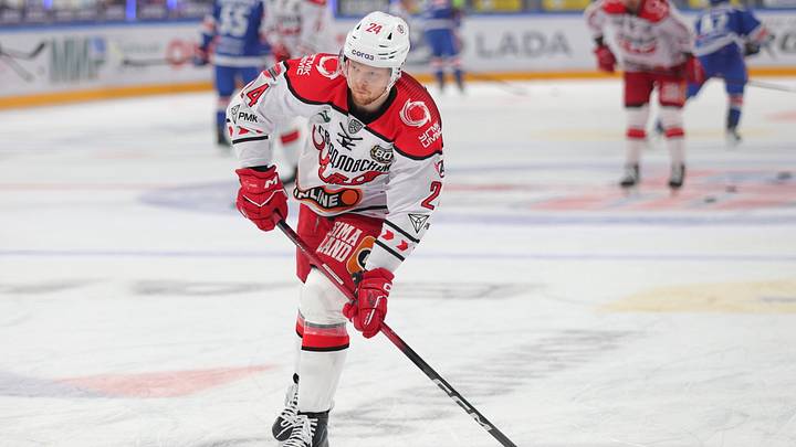 Maxim Denezhkin (24) of Avtomobilist Hockey Club seen in
