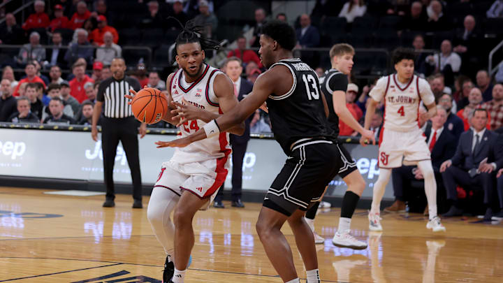 Mar 12, 2026; New York, NY, USA; St. John's basketball forward Zuby Ejiofor (24) controls the ball against Providence Friars forward Cole Hargrove (13) during the second half at Madison Square Garden.