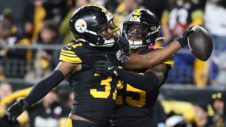 Oct 28, 2024; Pittsburgh, Pennsylvania, USA; Pittsburgh Steelers cornerback Beanie Bishop Jr. (31) and safety DeShon Elliott (25) celebrate an interception by Bishop against the New York Giants during the fourth quarter at Acrisure Stadium.  