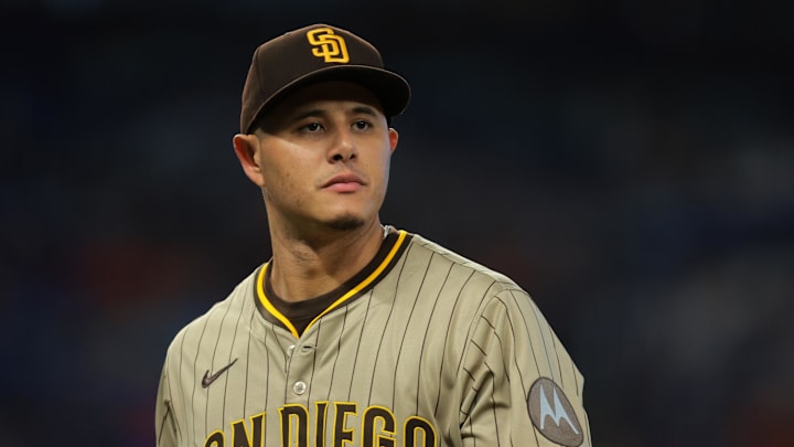 Jul 23, 2025; Miami, Florida, USA; San Diego Padres third baseman Manny Machado (13) looks on against the Miami Marlins during the sixth inning at loanDepot Park. Mandatory Credit: Sam Navarro-Imagn Images
