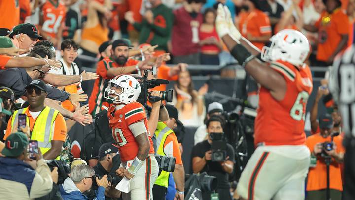 Oct 17, 2026; Miami Gardens, Florida, USA; Miami Hurricanes quarterback Darian Mensah (10) celebrates after a two-point conversion during overtime against the Florida State Seminoles at Hard Rock Stadium. Mandatory Credit: Sam Navarro-Imagn Images Oct 17, 2026; Miami Gardens, Florida, USA; Miami Hurricanes quarterback Darian Mensah (10) celebrates after a two-point conversion during overtime against the Florida State Seminoles at Hard Rock Stadium. Mandatory Credit: Sam Navarro-Imagn Images