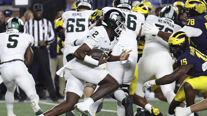 Oct 26, 2024; Ann Arbor, Michigan, USA;  Michigan State Spartans quarterback Aidan Chiles (2) rushes in the first half against the Michigan Wolverines at Michigan Stadium. Mandatory Credit: Rick Osentoski-Imagn Images