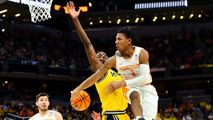 Tennessee guard Kennedy Chandler (1) passes the ball off to the teammate during the NCAA Tournament second round game between Tennessee and Michigan at Gainbridge Fieldhouse in Indianapolis, Ind., on Saturday, March 19, 2022.

Kns Ncaa Vols Michigan Bp