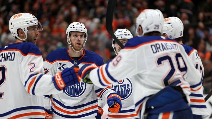 Apr 24, 2026; Anaheim, California, USA;  Edmonton Oilers center Connor McDavid (second from left) celebrates with teammates after scoring a a power play goal during the third period against the Anaheim Ducks in game three of the first round of the 2026 Stanley Cup Playoffs at Honda Center. Mandatory Credit: Kiyoshi Mio-Imagn Images
