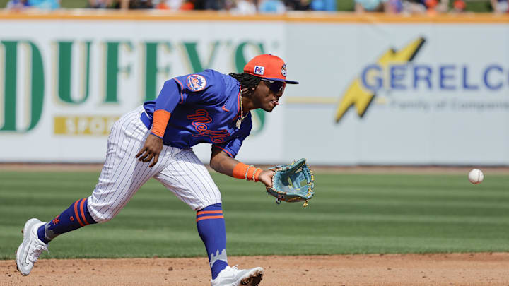 Feb 23, 2025; Port St. Lucie, Florida, USA;  New York Mets shortstop Luisangel Acuna (2) fields a ground ball during the third inning against the Miami Marlins at Clover Park. Mandatory Credit: Reinhold Matay-Imagn Images
