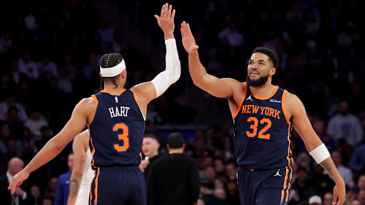 Mar 17, 2025; New York, New York, USA; New York Knicks center Karl-Anthony Towns (32) high fives guard Josh Hart (3) during the second quarter against the Miami Heat at Madison Square Garden. Mandatory Credit: Brad Penner-Imagn Images