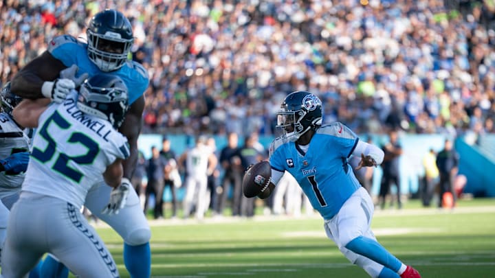 Tennessee quarterback Cam Ward (1) scrambles before diving into the end zone for a touchdown against Seattle during their game at Nissan Stadium Sunday, Nov. 23, 2025.