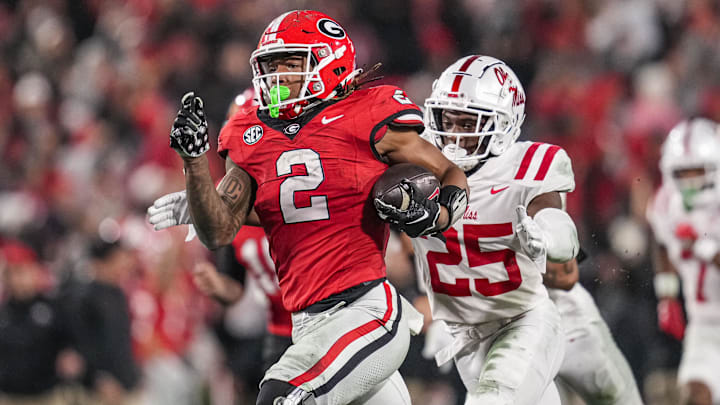 Nov 11, 2023; Athens, Georgia, USA; A Georgia Bulldogs running back Kendall Milton (2) breaks a long run against the Mississippi Rebels during the second half at Sanford Stadium. Mandatory Credit: Dale Zanine-Imagn Images Nov 11, 2023; Athens, Georgia, USA; A Georgia Bulldogs running back Kendall Milton (2) breaks a long run against the Mississippi Rebels during the second half at Sanford Stadium. Mandatory Credit: Dale Zanine-Imagn Images