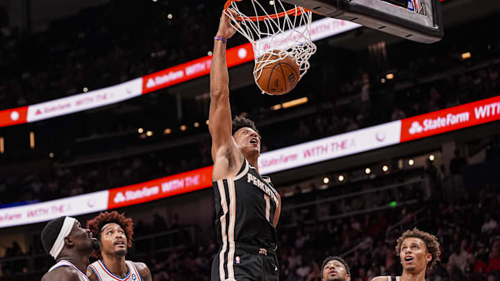 Mar 7, 2026; Atlanta, Georgia, USA; Atlanta Hawks forward Jalen Johnson (1) dunks against the Philadelphia 76ers during the second half at State Farm Arena. Mandatory Credit: Dale Zanine-Imagn Images
