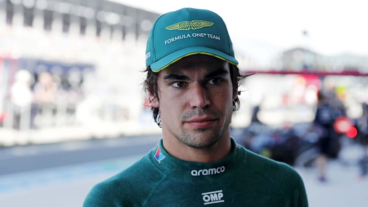 May 4, 2024; Miami Gardens, Florida, USA; Aston Martin driver Lance Stroll (18) walks in the paddock May 4, 2024; Miami Gardens, Florida, USA; Aston Martin driver Lance Stroll (18) walks in the paddock