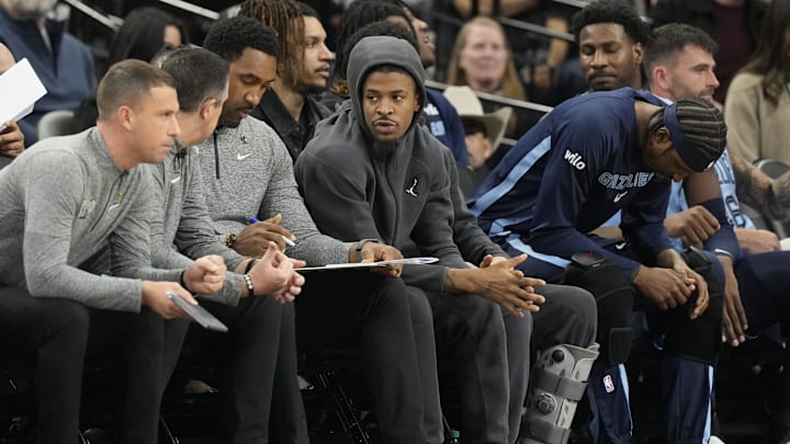 Dec 2, 2025; San Antonio, Texas, USA; Memphis Grizzlies guard Ja Morant (12) watches a game against the San Antonio Spurs from the bench at Frost Bank Center. Mandatory Credit: Scott Wachter-Imagn Images