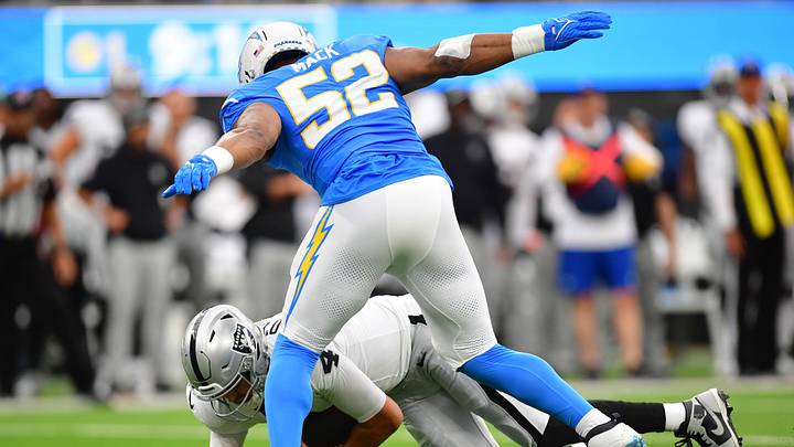 Oct 1, 2023; Inglewood, California, USA; Los Angeles Chargers linebacker Khalil Mack (52) sacks Las Vegas Raiders quarterback Aidan O'Connell (4) during the first half at SoFi Stadium. Mandatory Credit: Gary A. Vasquez-USA TODAY Sports