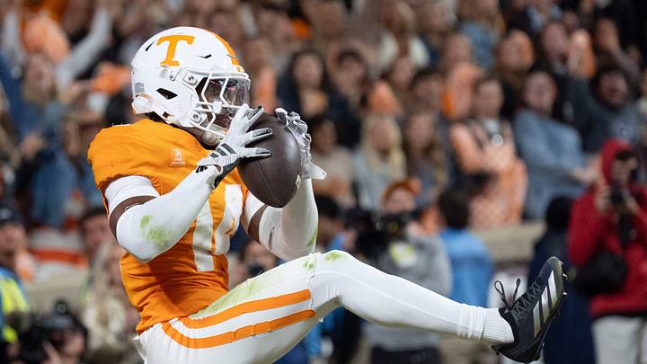 Tennessee defensive back Kayin Lee (14) intercepts a pass on Alabama’s final play during aa college football game on Oct. 17, 2026, in Knoxville, Tennessee.