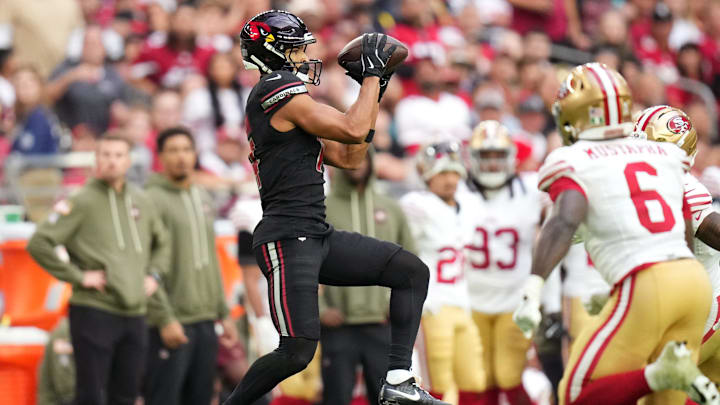 Arizona Cardinals receiver Michael Wilson (14) catches a pass against the San Francisco 49ers at State Farm Stadium in Glendale on Nov. 16, 2025. Arizona Cardinals receiver Michael Wilson (14) catches a pass against the San Francisco 49ers at State Farm Stadium in Glendale on Nov. 16, 2025.