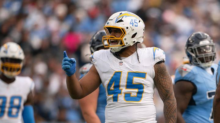Nov 2, 2025; Nashville, Tennessee, USA; Los Angeles Chargers linebacker Tuli Tuipulotu (45) points after a sack against the Tennessee Titans during the first half at Nissan Stadium. Mandatory Credit: Steve Roberts-Imagn Images Nov 2, 2025; Nashville, Tennessee, USA; Los Angeles Chargers linebacker Tuli Tuipulotu (45) points after a sack against the Tennessee Titans during the first half at Nissan Stadium. Mandatory Credit: Steve Roberts-Imagn Images