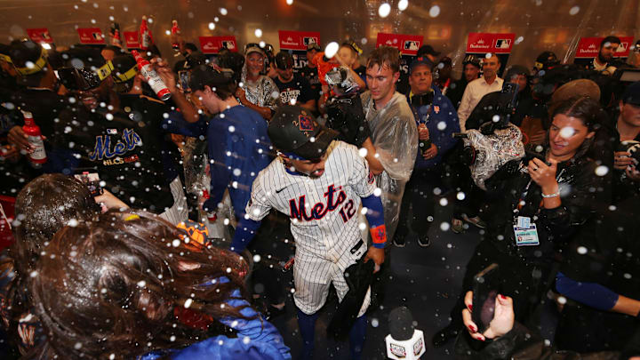 New York Mets shortstop Francisco Lindor (12) celebrates in the clubhouse after defeating the Philadelphia Phillies in game four of the NLDS for the 2024 MLB Playoffs at Citi Field on Oct 9. New York Mets shortstop Francisco Lindor (12) celebrates in the clubhouse after defeating the Philadelphia Phillies in game four of the NLDS for the 2024 MLB Playoffs at Citi Field on Oct 9.