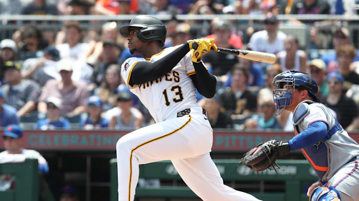 Jun 29, 2025; Pittsburgh, Pennsylvania, USA; Pittsburgh Pirates third baseman Ke'Bryan Hayes (13) hits a two run single against the New York Mets during the first inning at PNC Park. Mandatory Credit: Charles LeClaire-Imagn Images Jun 29, 2025; Pittsburgh, Pennsylvania, USA; Pittsburgh Pirates third baseman Ke'Bryan Hayes (13) hits a two run single against the New York Mets during the first inning at PNC Park. Mandatory Credit: Charles LeClaire-Imagn Images