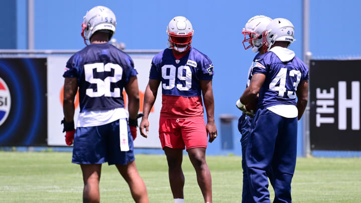 Jun 10, 2024; Foxborough, MA, USA;  New England Patriots defensive end Keion White (99) works with the defense at minicamp at Gillette Stadium. Mandatory Credit: Eric Canha-USA TODAY Sports