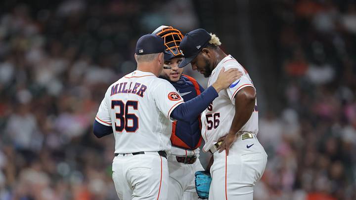 Sep 1, 2026; Houston, Texas, USA;  Houston Astros pitching coach Joshua Miller (36) talks with catcher Yainer Diaz (21) and starting pitcher Ronel Blanco (56) during the second inning against the Chicago White Sox at Daikin Park.  Mandatory Credit: Erik Williams-Imagn Images