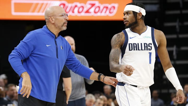 Dec 11, 2023; Memphis, Tennessee, USA; Dallas Mavericks head coach Jason Kidd (left) talks with
