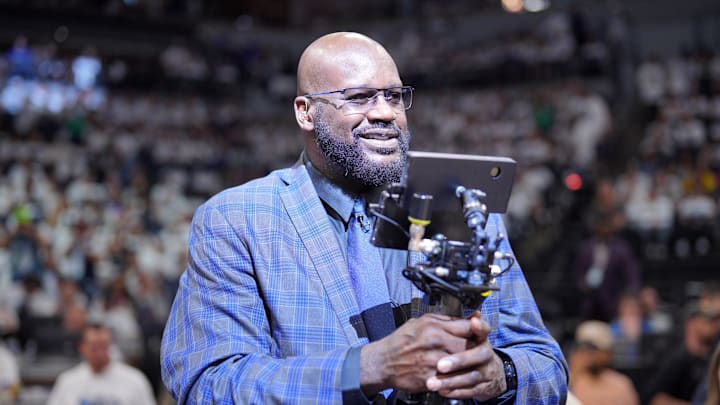 May 24, 2024; Minneapolis, Minnesota, USA; Shaquille O'Neal looks on during halftime between the Minnesota Timberwolves and the Dallas Mavericks during game two of the western conference finals for the 2024 NBA playoffs at Target Center. Mandatory Credit: Brad Rempel-Imagn Images
