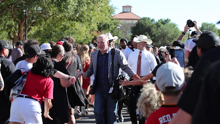 Sep 28, 2024; Lubbock, Texas, USA;  Texas Tech Red Raiders head coach Joey McGuire greets fans before the game between the Cincinnati Bearcats and the Texas Tech Red Raiders at Jones AT&T Stadium and Cody Campbell Field. Mandatory Credit: Michael C. Johnson-Imagn Images