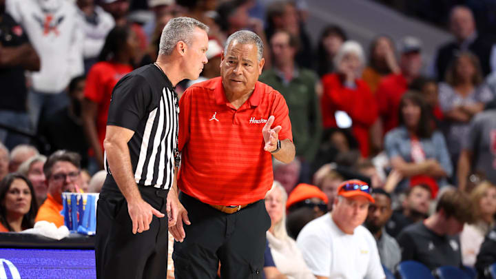 Nov 16, 2025; Birmingham, Alabama, USA; Houston Cougars head coach Kelvin Sampson speaks with an official during the second half against the Auburn Tigers at Legacy Arena at BJCC. Mandatory Credit: David Leong-Imagn Images