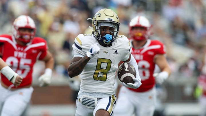 Sep 14, 2024; Atlanta, Georgia, USA; Georgia Tech Yellow Jackets wide receiver Malik Rutherford (8) runs after a catch against the Virginia Military Institute Keydets in the first quarter at Bobby Dodd Stadium at Hyundai Field. Mandatory Credit: Brett Davis-Imagn Images