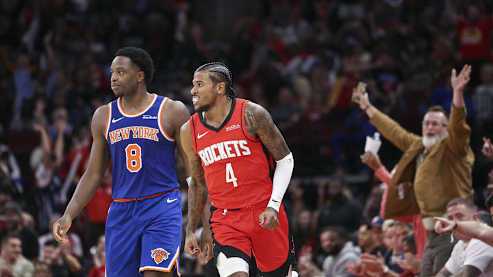 Nov 4, 2024; Houston, Texas, USA; Houston Rockets guard Jalen Green (4) and New York Knicks forward OG Anunoby (8) react after Green scores a basket during the fourth quarter at Toyota Center. Mandatory Credit: Troy Taormina-Imagn Images