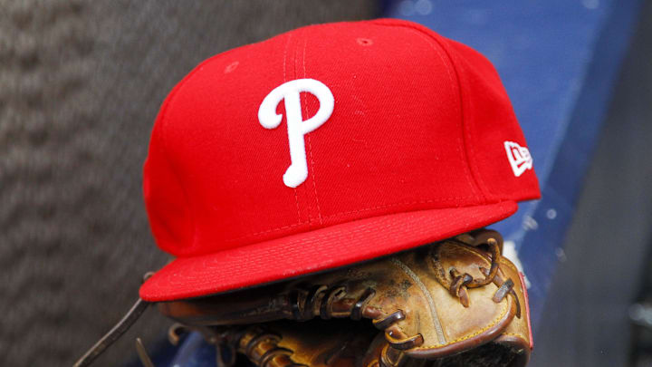 Aug 8, 2017; Atlanta, GA, USA; A detailed view of Philadelphia Phillies shortstop Freddy Galvis (not pictured) hat and glove in the dugout against the Atlanta Braves in the first inning at SunTrust Park. Mandatory Credit: Brett Davis-Imagn Images
Aug 8, 2017; Atlanta, GA, USA; A detailed view of Philadelphia Phillies shortstop Freddy Galvis (not pictured) hat and glove in the dugout against the Atlanta Braves in the first inning at SunTrust Park. Mandatory Credit: Brett Davis-Imagn Images