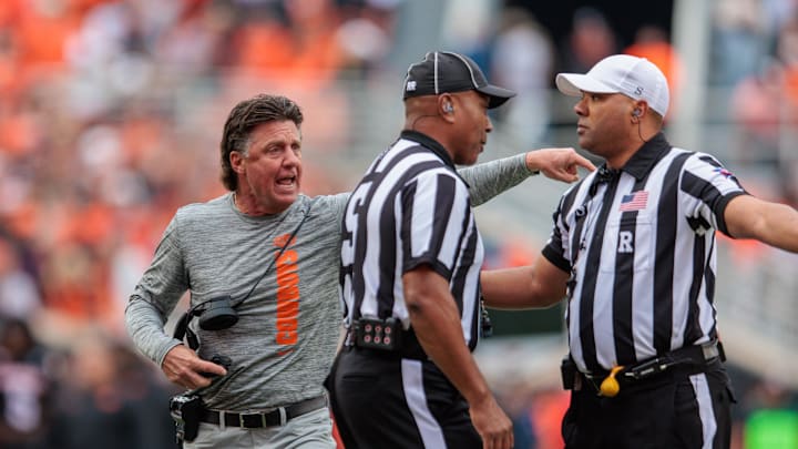 Nov 2, 2024; Stillwater, Oklahoma, USA; Oklahoma State Cowboys coach Mike Gundy reacts after a play during the second quarter against the Arizona State Sun Devils at Boone Pickens Stadium. Mandatory Credit: William Purnell-Imagn Images