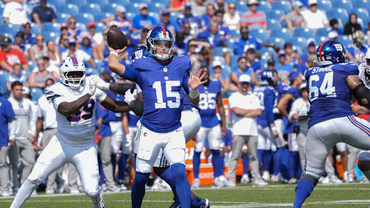 Aug 9, 2025; Orchard Park, New York, USA; New York Giants quarterback Tommy DeVito (15) throws the ball against the Buffalo Bills during the second half at Highmark Stadium. Mandatory Credit: Gregory Fisher-Imagn Images