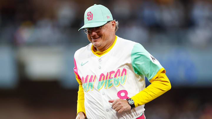 Aug 22, 2025; San Diego, California, USA; San Diego Padres manager Mike Shildt (8) runs off the field during the third inning against the Los Angeles Dodgers at Petco Park. Mandatory Credit: David Frerker-Imagn Images