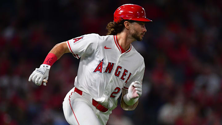 Sep 26, 2025; Anaheim, California, USA; Los Angeles Angels center fielder Bryce Teodosio (22) runs after hitting a single against the Houston Astros during the third inning at Angel Stadium. Mandatory Credit: Gary A. Vasquez-Imagn Images
